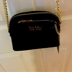 Black purse with gold chain straps